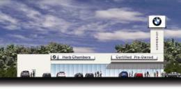 Pre-owned BMW dealership plan for old Ch. 56 lot.: Herb Chambers Co. says project has been stalled by engineering problems.